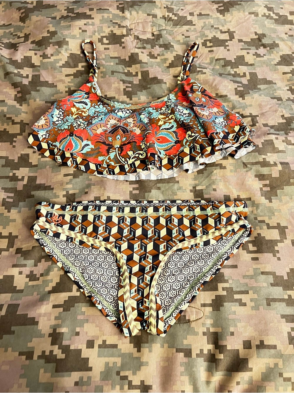 MaajiPatterned Ruffle Bikini Set with reversible bottoms.